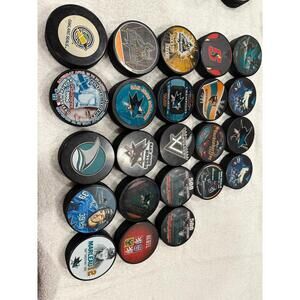 Lot of 23 Vintage NHL San Jose Sharks Authentic Hockey Pucks